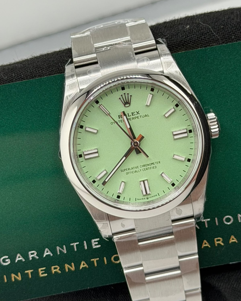 Rolex Oyster Perpetual Mint Green Dial Steel Smooth Bezel On Oyster Bracelet