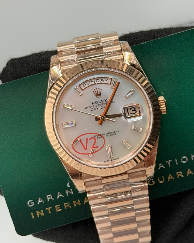Rolex Oyster Perpetual Day-Date White Dial Baguette Diamond Markers Rose Gold Fluted Bezel On President Bracelet