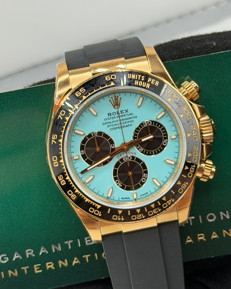 Rolex Oyster Perpetual Cosmograph Daytona Tiffany Blue Dial Black Subdials Yellow Gold Black Ceramic Bezel On Black Rubber Strap