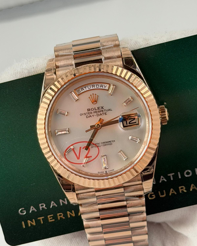 Rolex Oyster Perpetual Day-Date Rose Gold Dial Diamond Baguette Markers Rose Gold President Bracelet