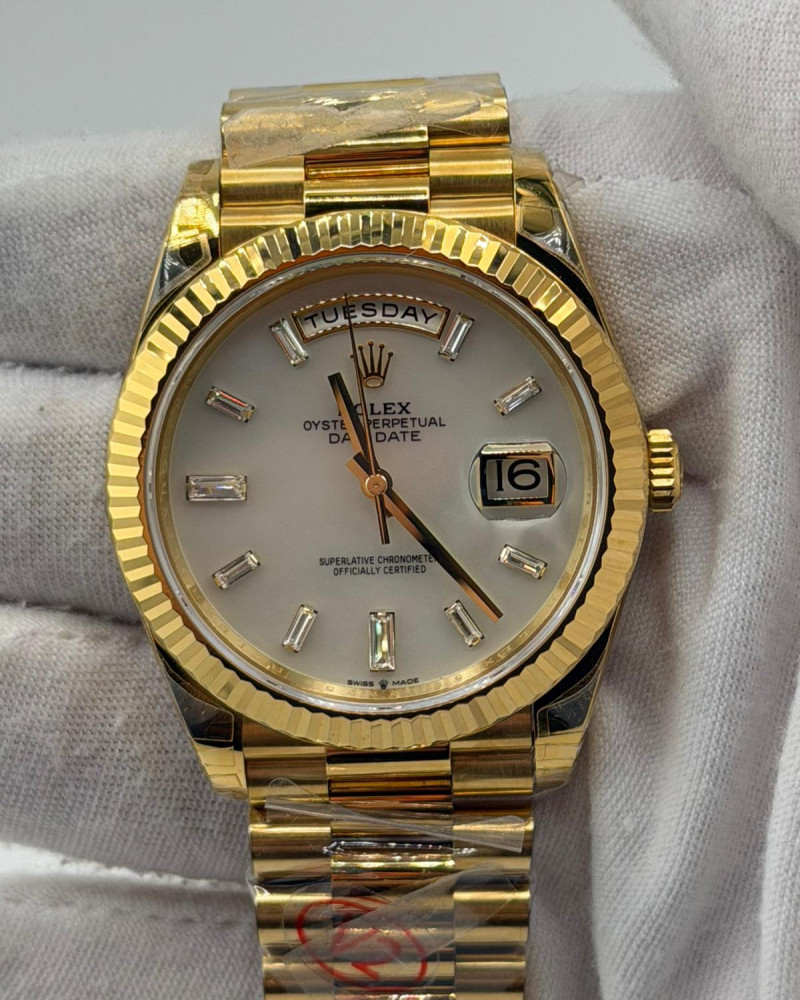 Rolex Day-Date 40 Silver Baguette Diamond Dial On Yellow Gold President Bracelet