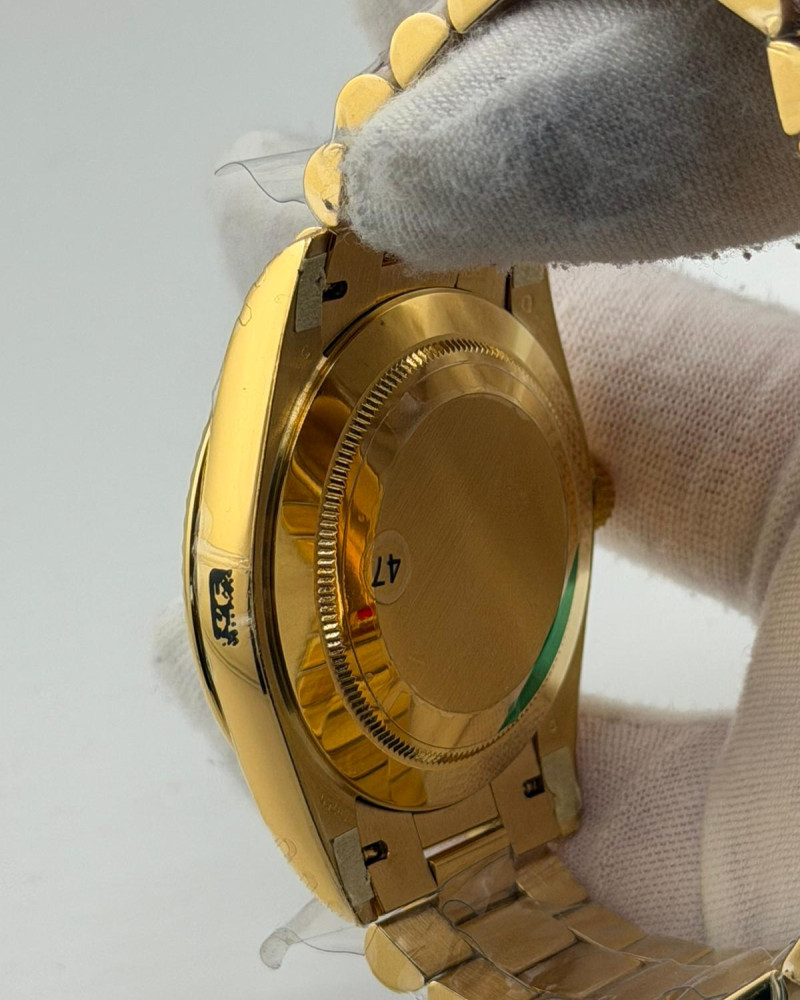 Rolex Day-Date 40 Silver Baguette Diamond Dial On Yellow Gold President Bracelet