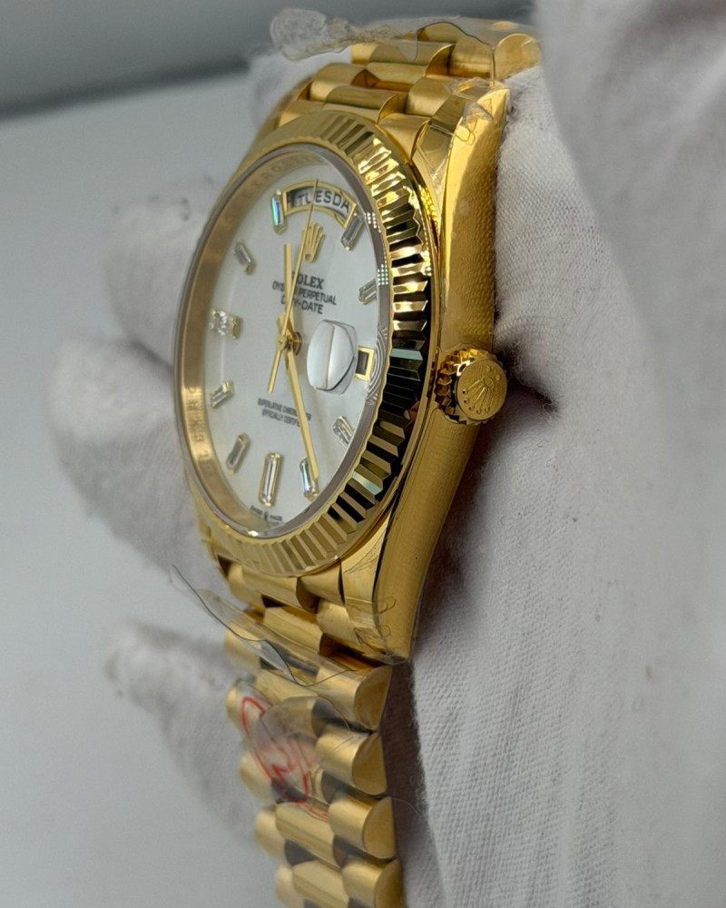 Rolex Day-Date 40 Silver Baguette Diamond Dial On Yellow Gold President Bracelet